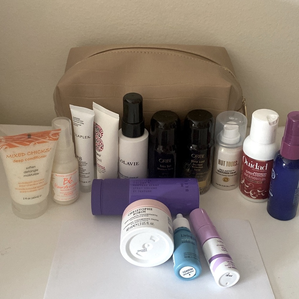 New HAIR CARE . 12 travel size and 2 mini not opened or tried